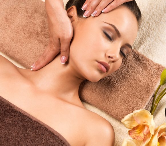 beautiful-young-woman-relaxing-with-head-massage-8JQUYL4